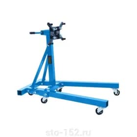 Стенд для разборки двигателей Прочее 05.085.12, г/п 900 кг, высота от пола 800 мм, оснащён 6 колёсами, размеры фланца 250х150х12 мм.
