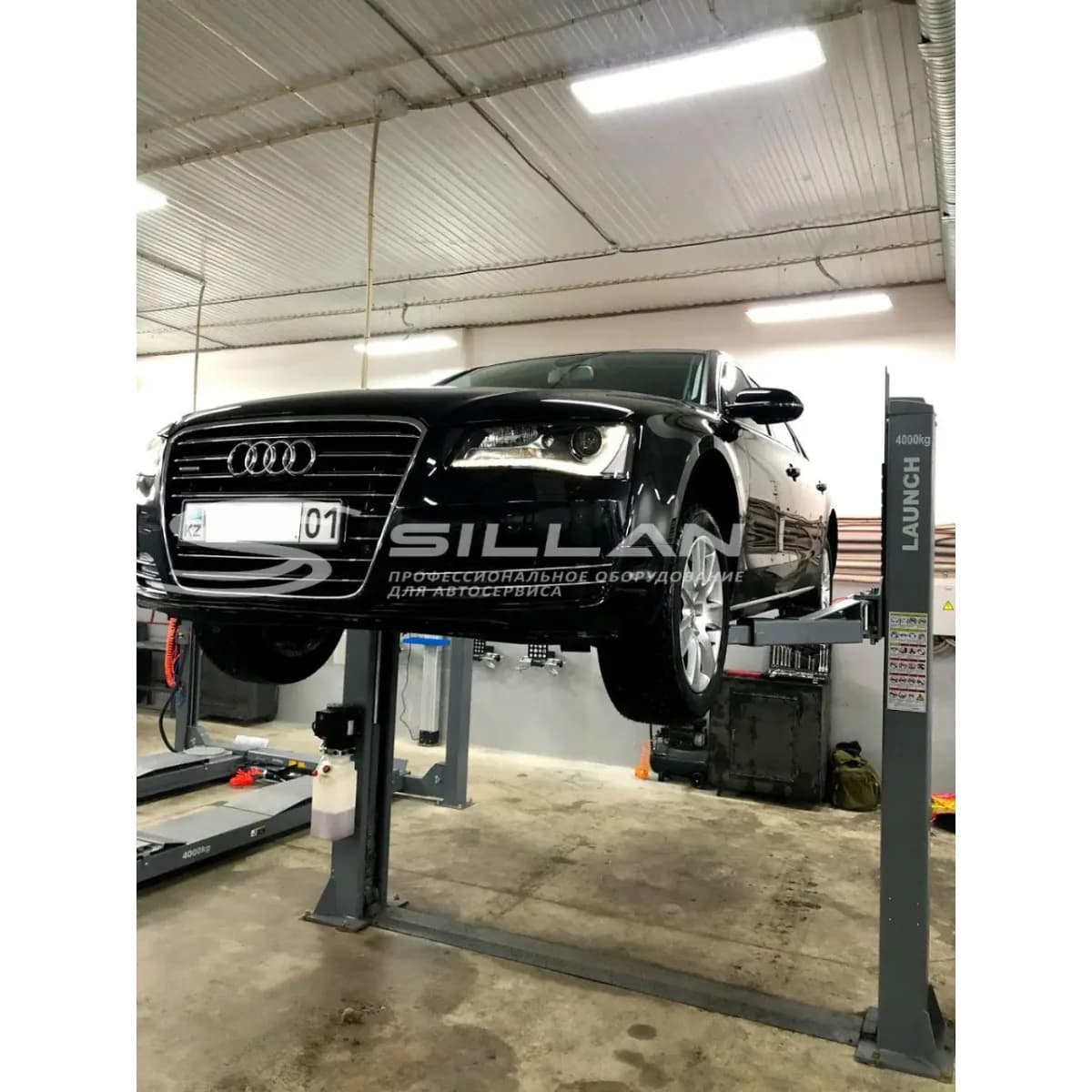 Подъемник электрогидравлический Launch TLT-240SC двухстоечный, 4т., 220В., верхняя синхронизация