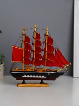 Сувенирная модель корабля «Флора», борта чёрные с белой полосой, паруса алые, 32×6.5×31 см