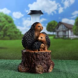 Садовая фигура - фонарь из полистоуна «Три ежа на пне», 27×26×34 см