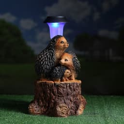 Садовая фигура - фонарь из полистоуна «Три ежа на пне», 27×26×34 см