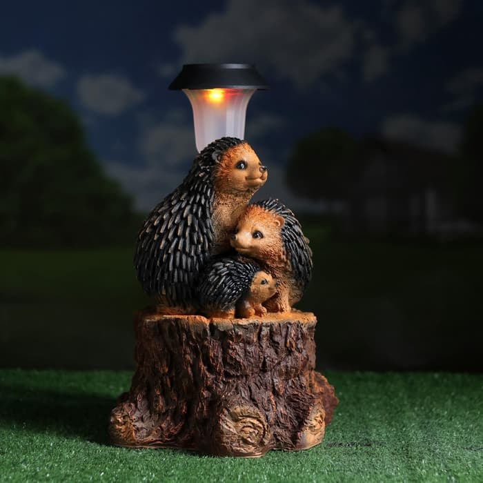Садовая фигура - фонарь из полистоуна «Три ежа на пне», 27×26×34 см
