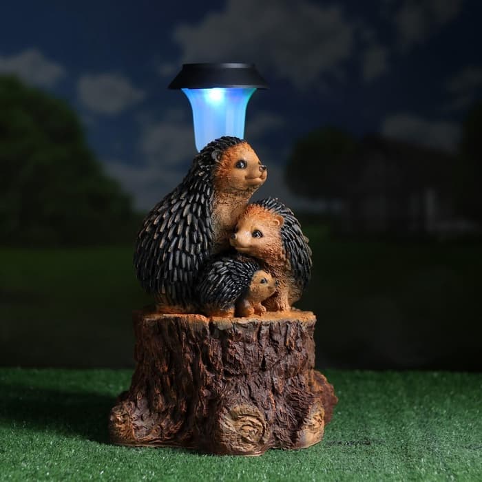 Садовая фигура - фонарь из полистоуна «Три ежа на пне», 27×26×34 см