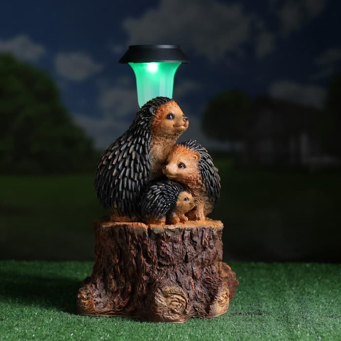 Садовая фигура - фонарь из полистоуна «Три ежа на пне», 27×26×34 см