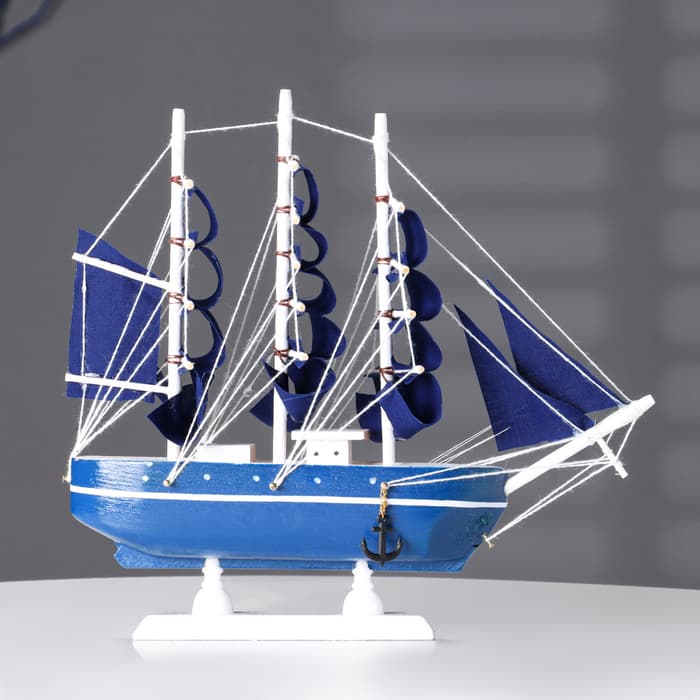 Сувенирная модель корабля «Дорита», борта синие с белой полосой, паруса синие, 23×5.5×21 см