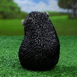 Садовая фигура из гипса «Ежик с цветами», 15×11×12 см