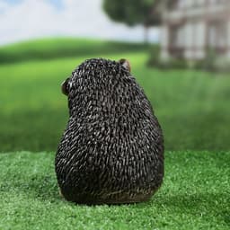 Садовая фигура из гипса «Ежик с цветами», 15×11×12 см