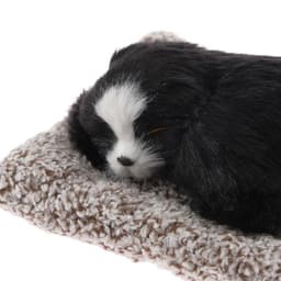 Игрушка на панель автомобиля «Собака на подушке» черный