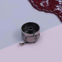 Шпульный колпачок к БШМ, левый, 3×2.5×1.5 см