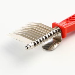 Колтунорез боковой, 9 лезвий, 6.5×17 см, красный