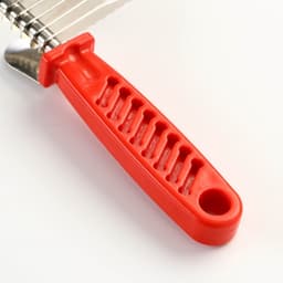 Колтунорез боковой, 9 лезвий, 6.5×17 см, красный