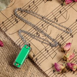 Губная гармошка Music Life 4 отверстия, 8 тонов, 3.5×1.5×1 см, цепь 28 см, зеленая