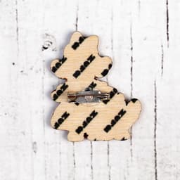 Деревянный значок ZUFA «Мисс Пря»