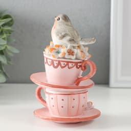 Фигурка полистоун «Снегирь сидит на чашечках, с цветами», 9×9×14 см