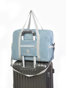 Сумка дорожная на молнии, 3 наружных кармана, держатель для чемодана, длинный ремень, серая