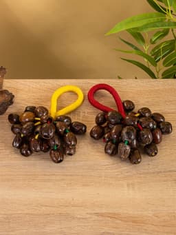 Сувенирный музыкальный инструмент «Погремушка», 16×10×3 см, орех кемири, МИКС