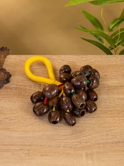 Сувенирный музыкальный инструмент «Погремушка», 16×10×3 см, орех кемири, МИКС