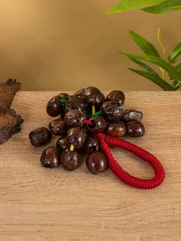 Сувенирный музыкальный инструмент «Погремушка», 16×10×3 см, орех кемири, МИКС