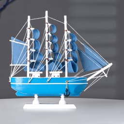 Сувенирная модель корабля «Аскольд», борта голубые с полосой, паруса голубые, 23.5×4.5×23 см